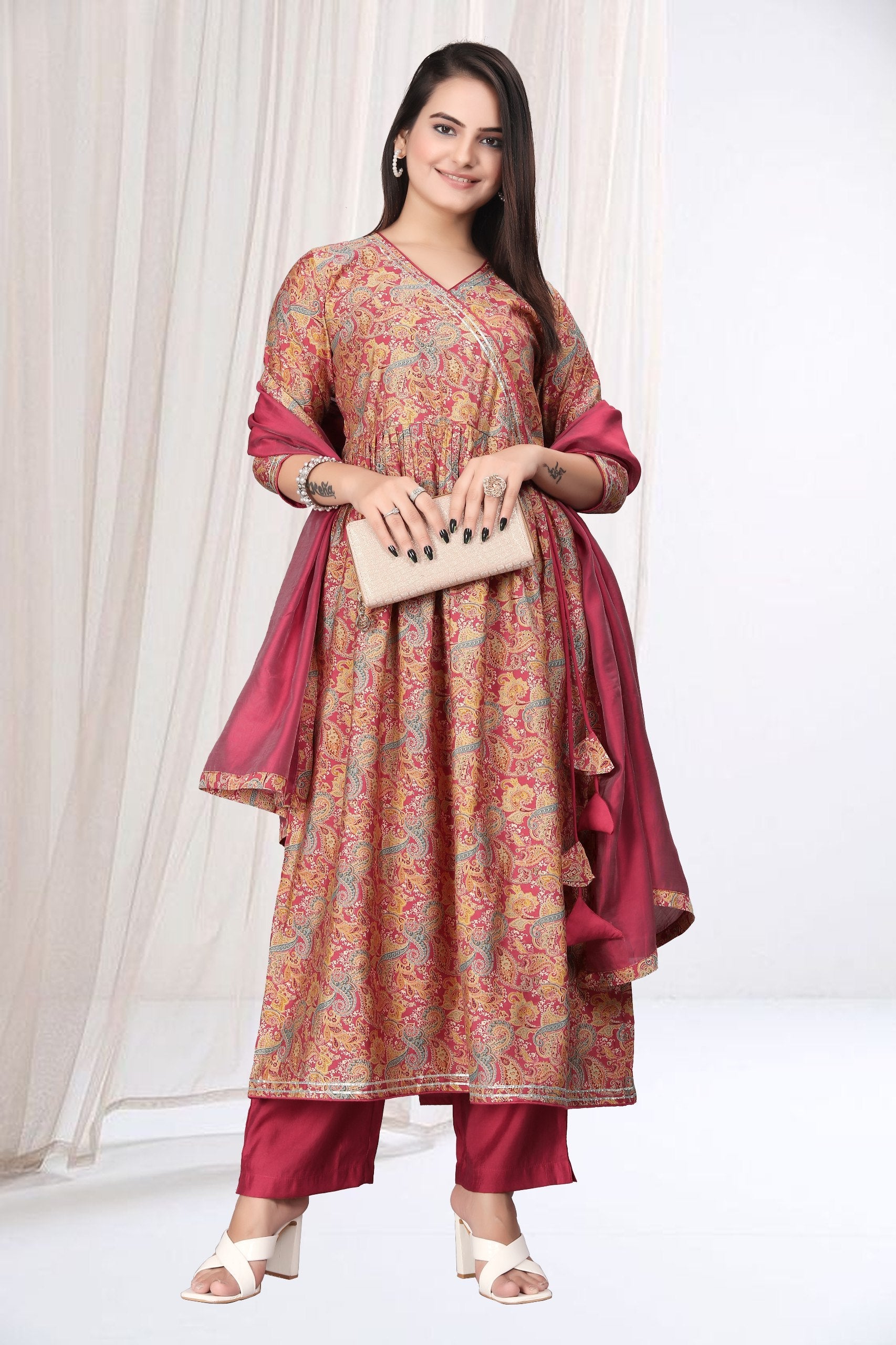 Luxurious Gajari Colour Kurta Set with Viscose Modal Dupatta and Bottom Wear